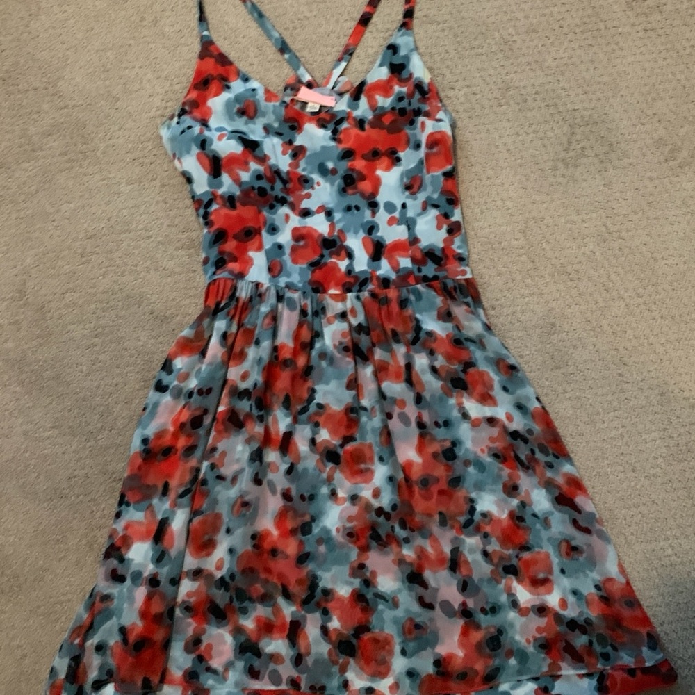 Gorgeous dress from Anthropologie Beautiful fabric! Cute bows on back!